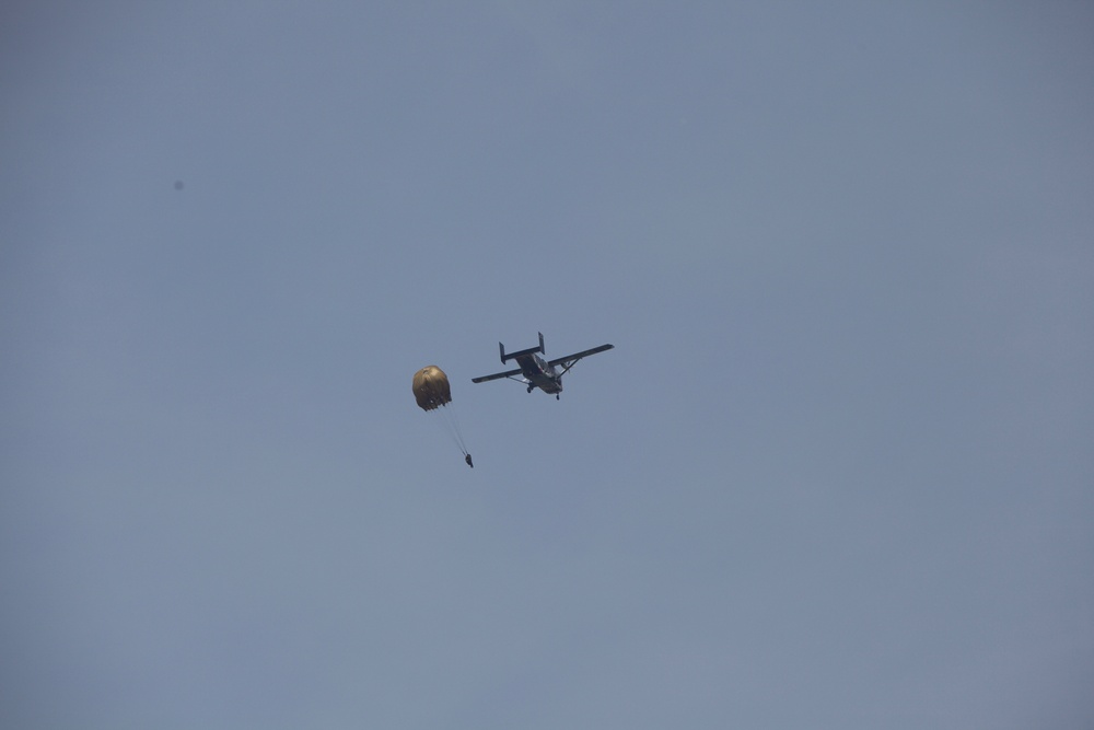 U.S. ARMY PARATROOPERS JUMP FROM A BALLOON IN BELGIUM