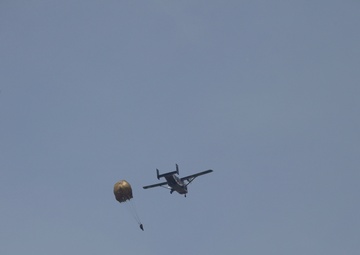 U.S. ARMY PARATROOPERS JUMP FROM A BALLOON IN BELGIUM