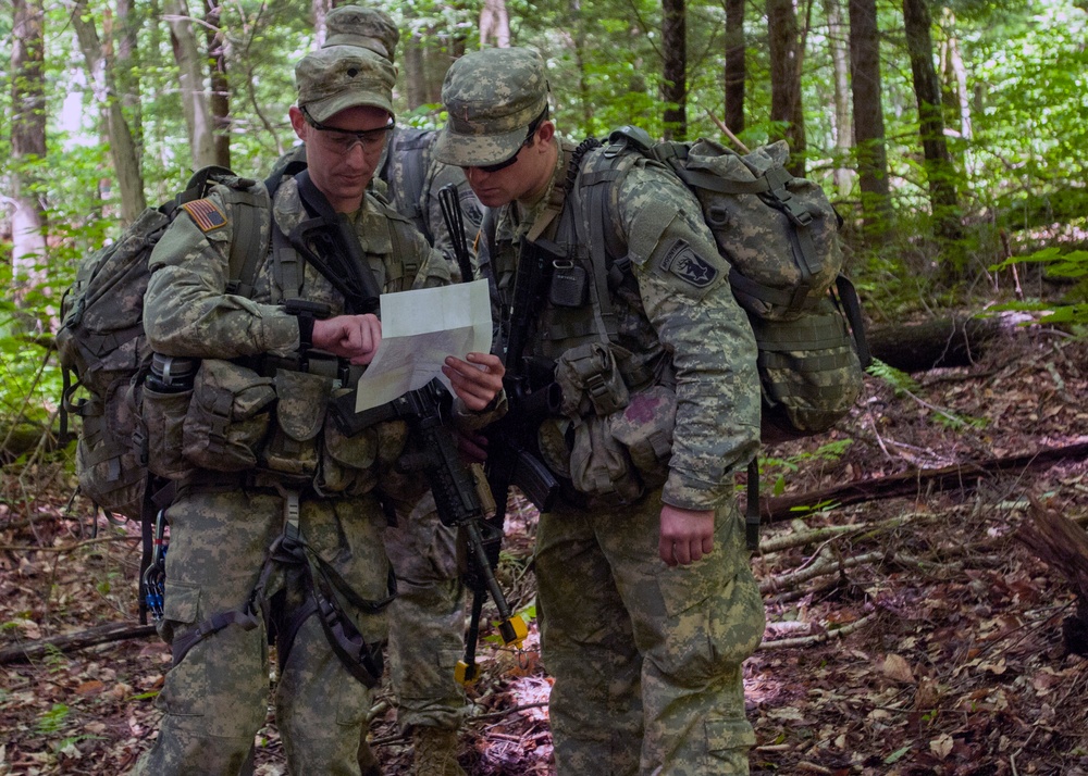 Soldiers Look Over a Map