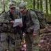 Soldiers Look Over a Map