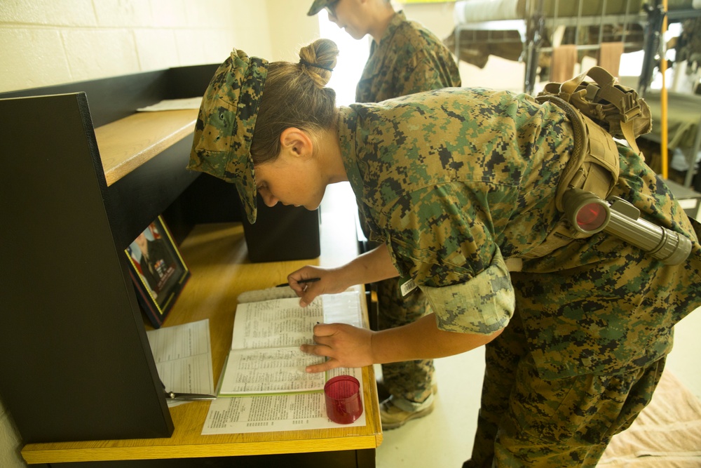 Marine recruits clean, prep for next training day on Parris Island