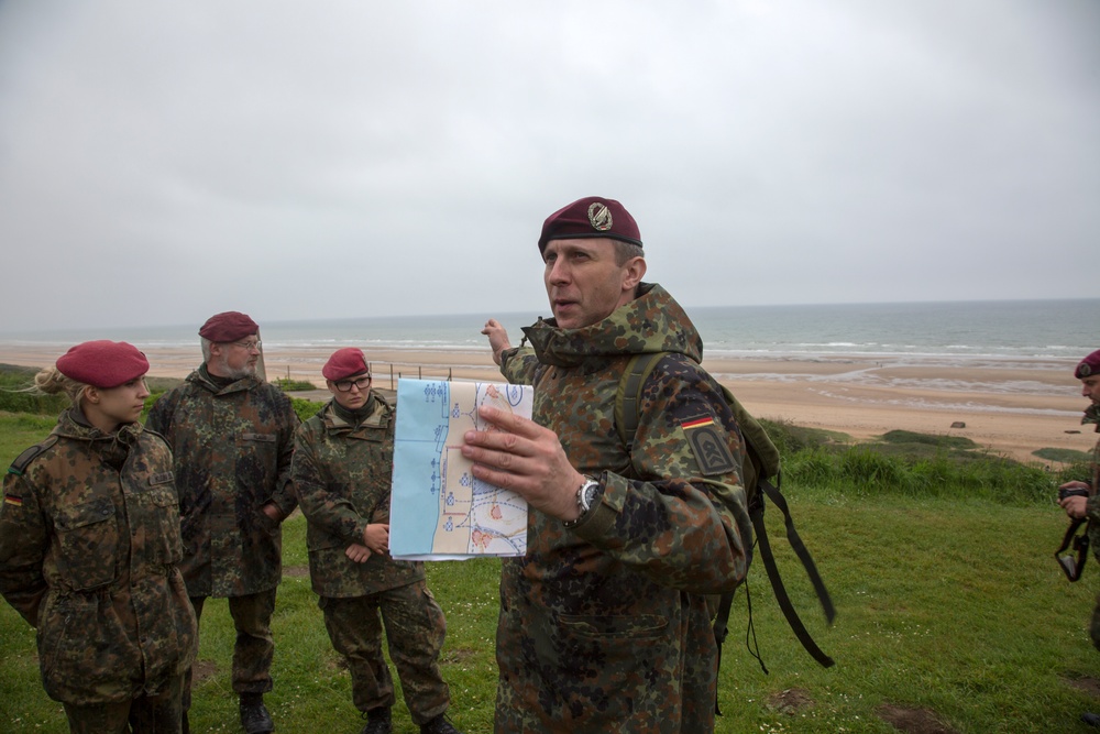 U.S. Army and German paratroopers visit Omaha Beach together