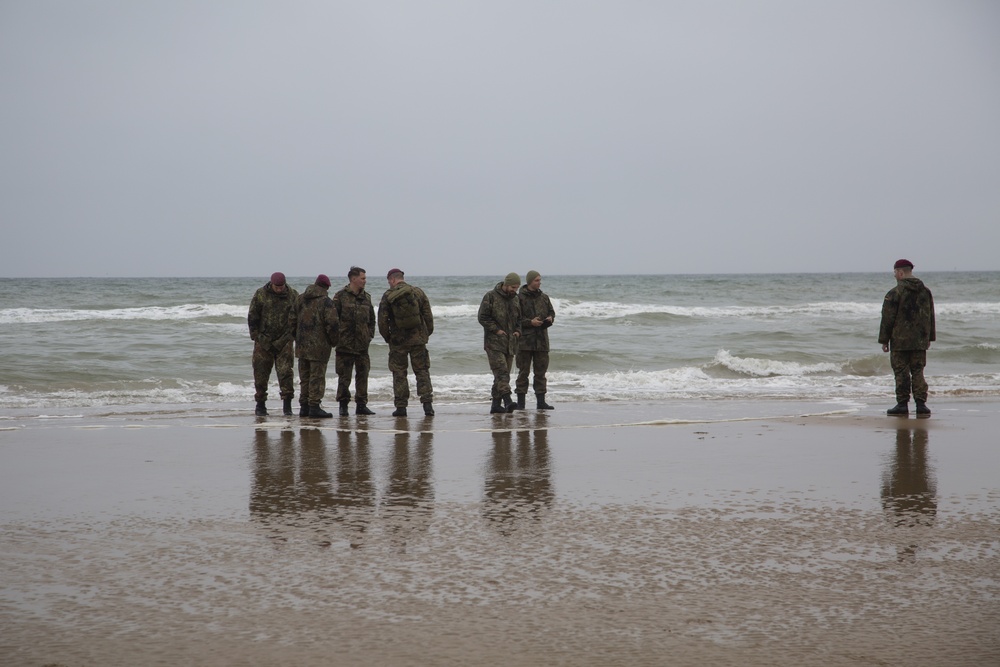 U.S. Army and German paratroopers visit Omaha Beach together