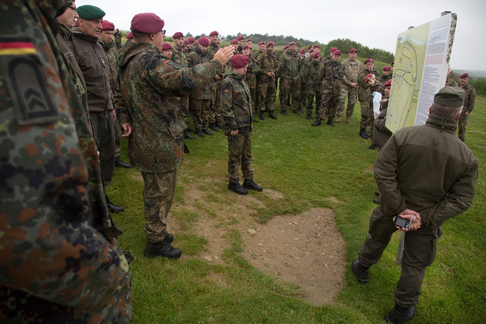 U.S. Army and German paratroopers visit Omaha Beach together