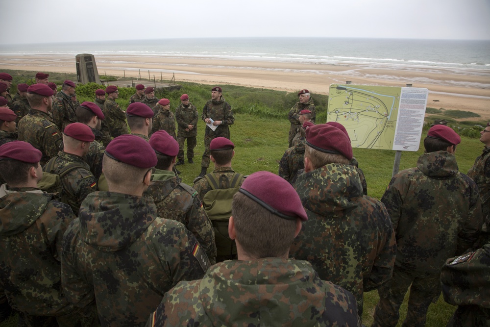 U.S. Army and German paratroopers visit Omaha Beach together