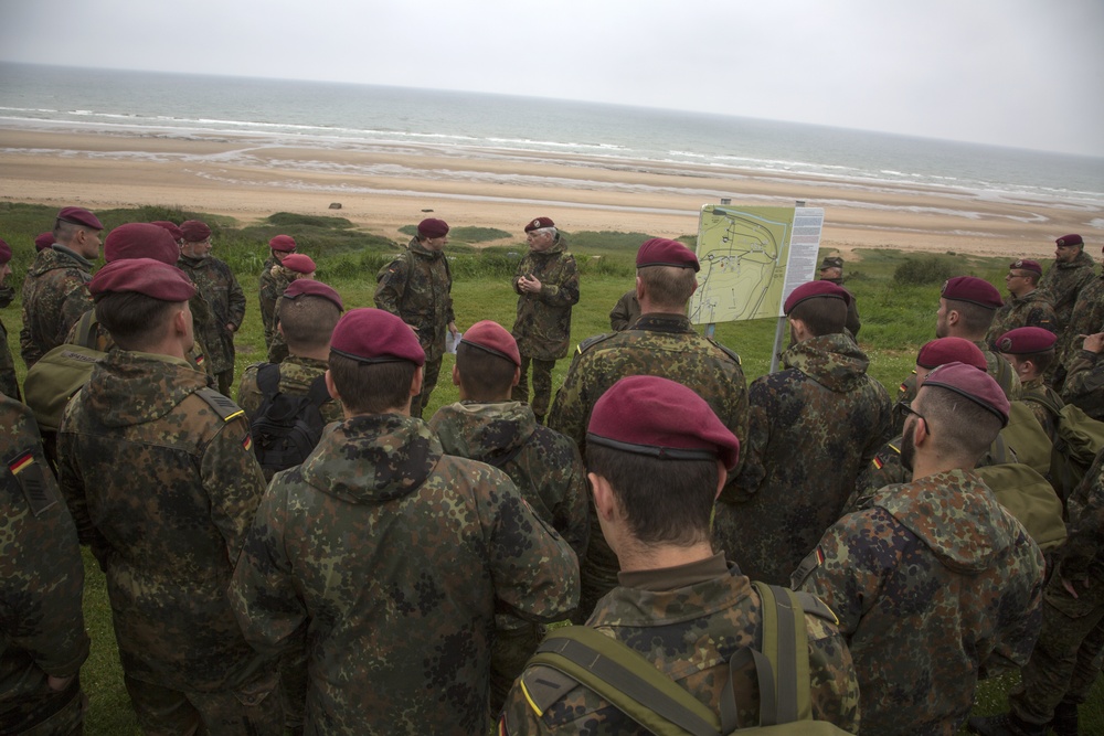 U.S. Army and German paratroopers visit Omaha Beach together