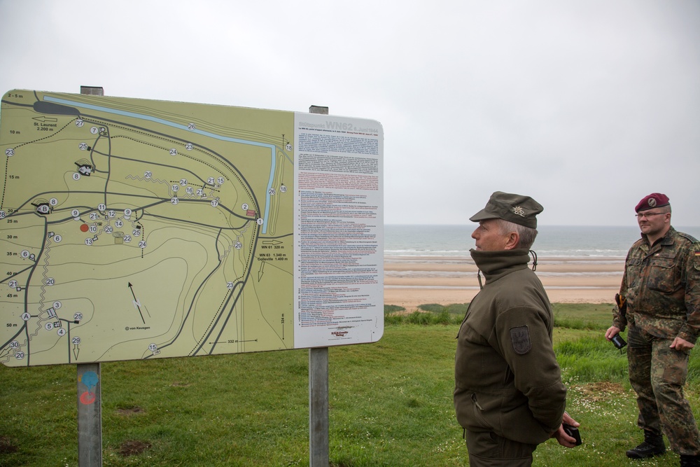 U.S. Army and German paratroopers visit Omaha Beach together