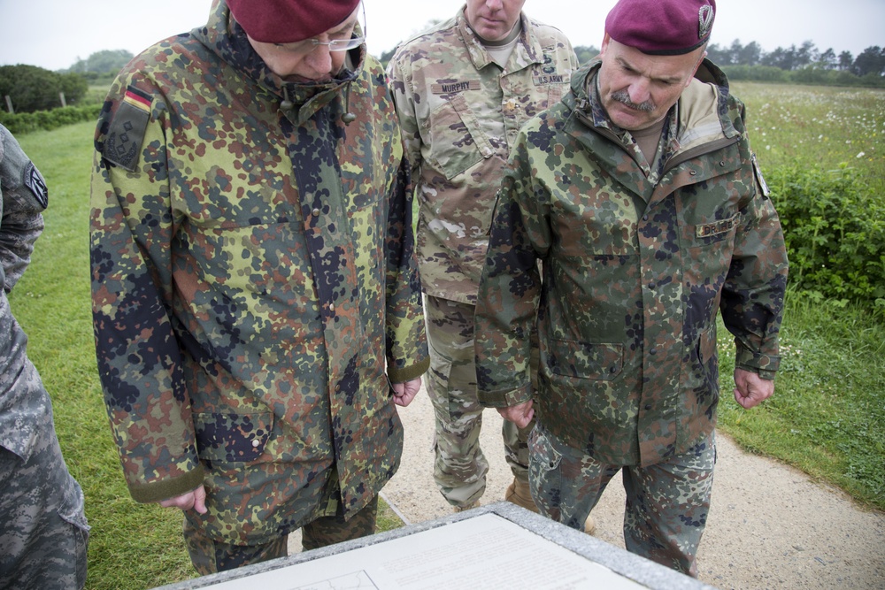 U.S. Army and German paratroopers visit Omaha Beach together