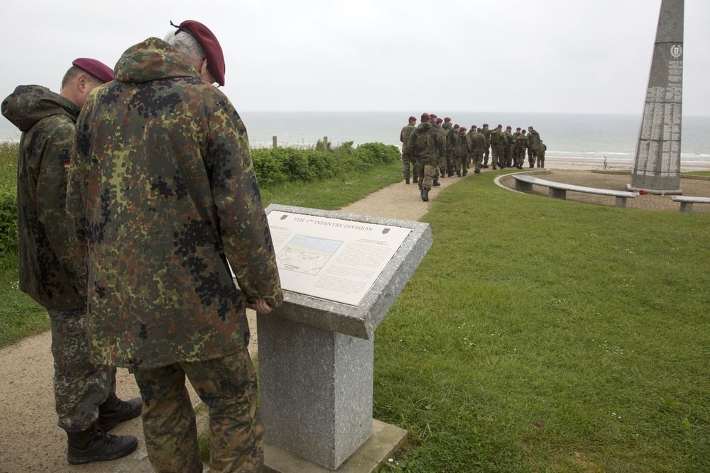 U.S. Army and German paratroopers visit Omaha Beach together