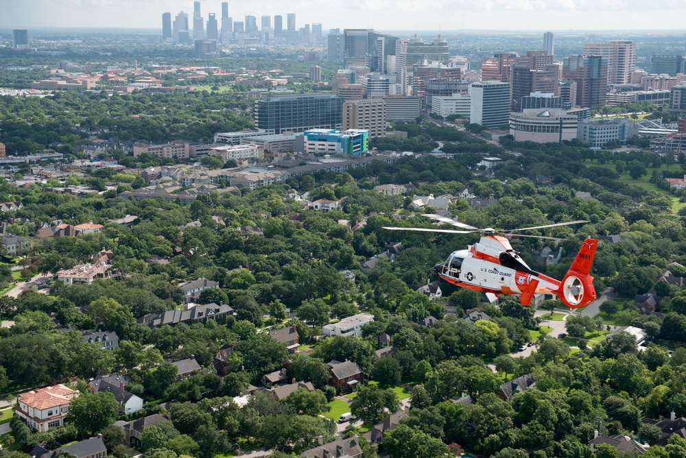 Air Station Houston centennial helicopter flies over Houston