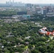 Air Station Houston centennial helicopter flies over Houston