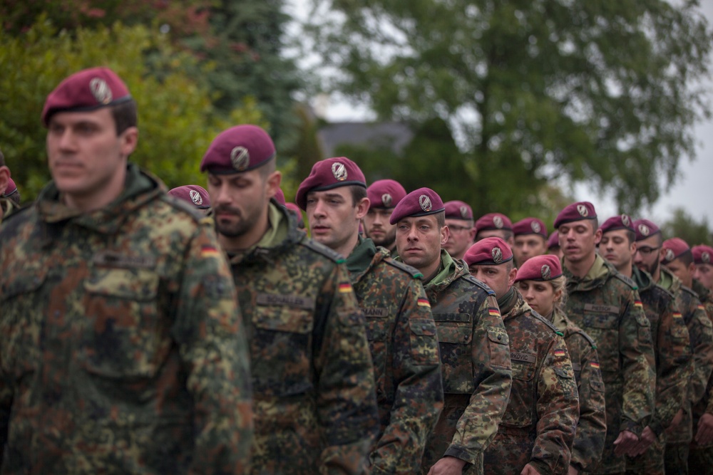 German Soldiers participate in a joint ceremony with U.S. Soldiers in Picauville, France