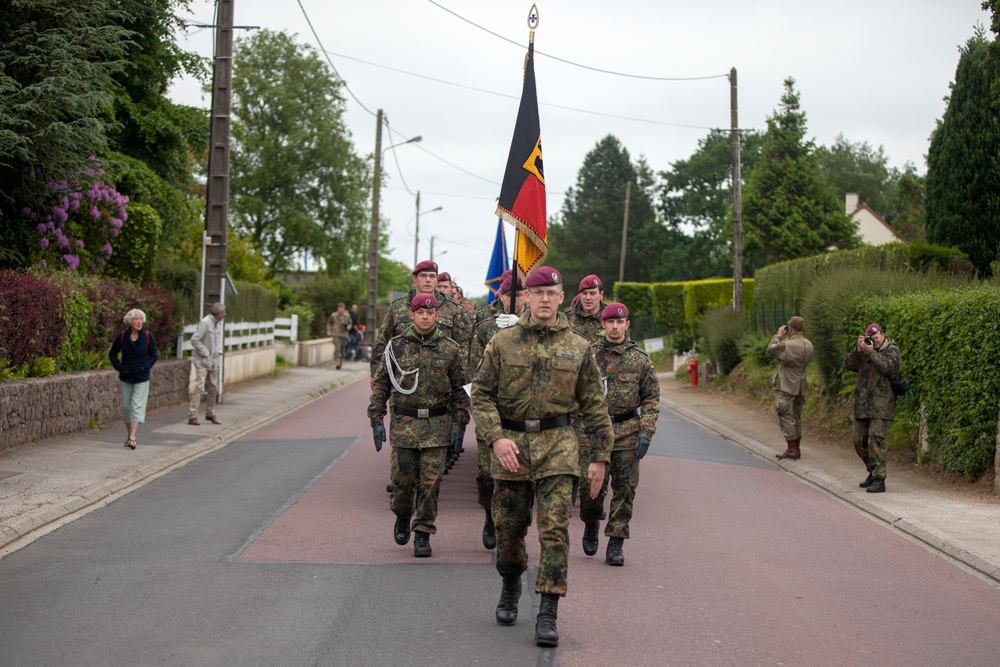 German Soldiers participate in a joint ceremony with U.S. Soldiers in Picauville, France