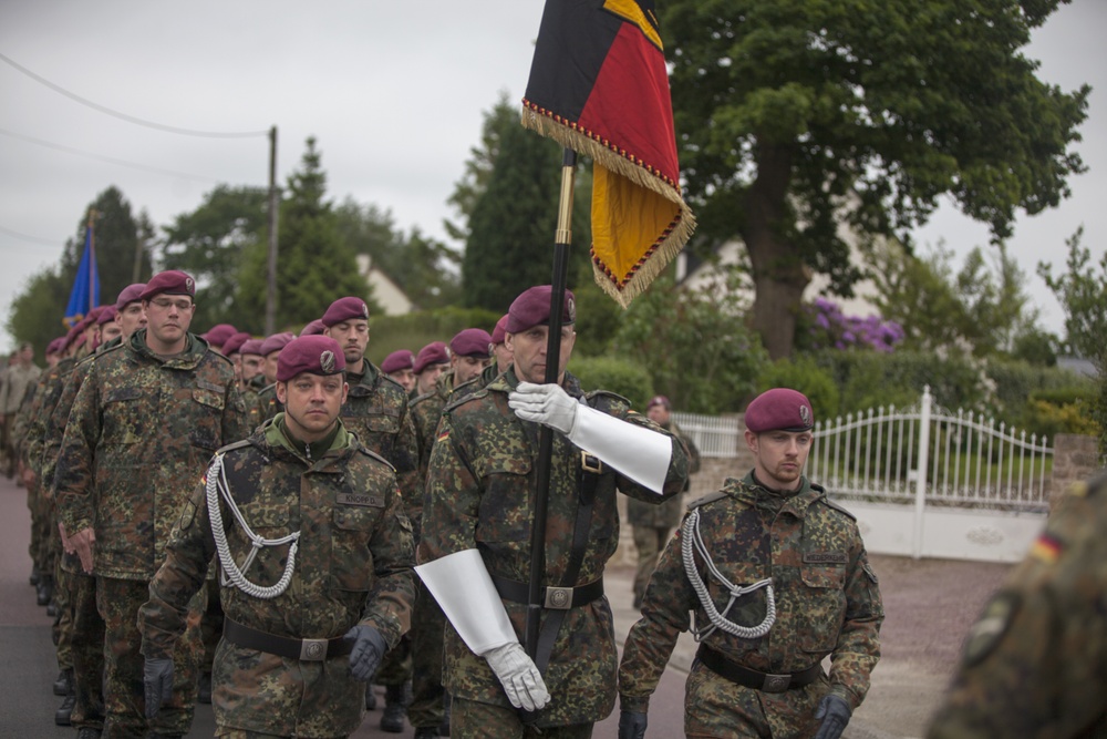 German Soldiers participate in a joint ceremony with U.S. Soldiers in Picauville, France