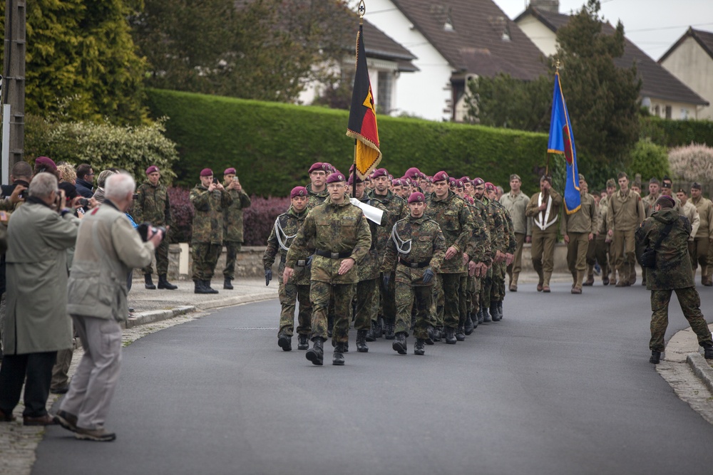 German Soldiers participate in a joint ceremony with U.S. Soldiers in Picauville, France