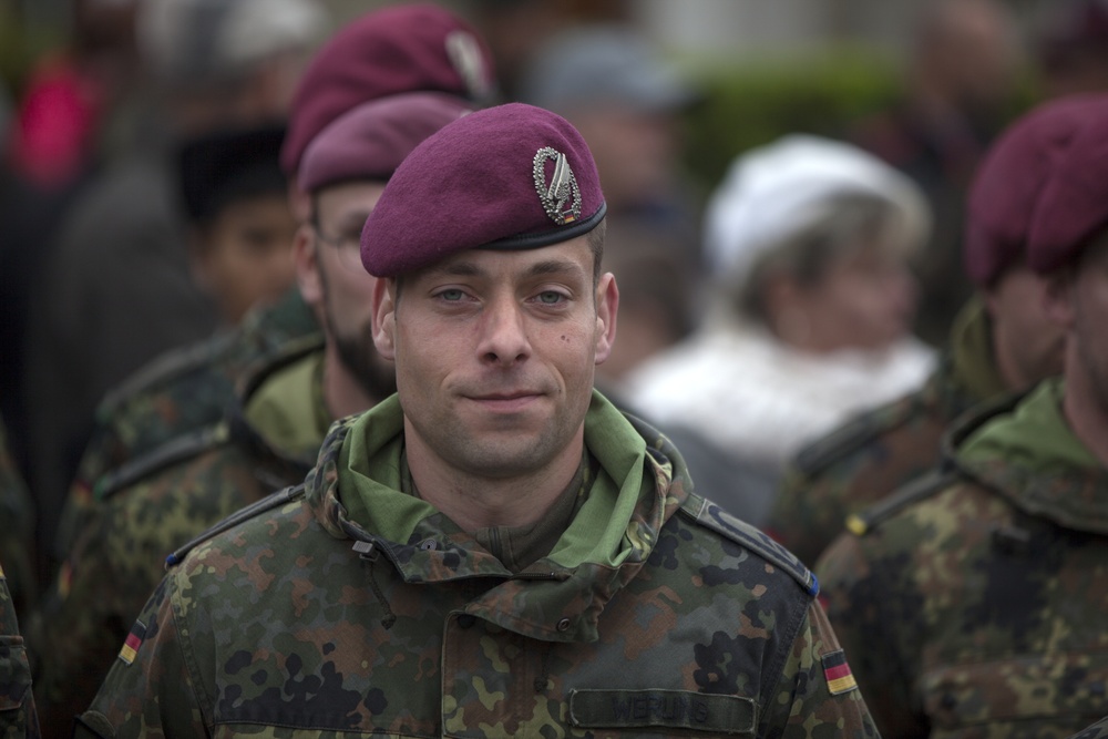 German Soldiers participate in a joint ceremony with U.S. Soldiers in Picauville, France