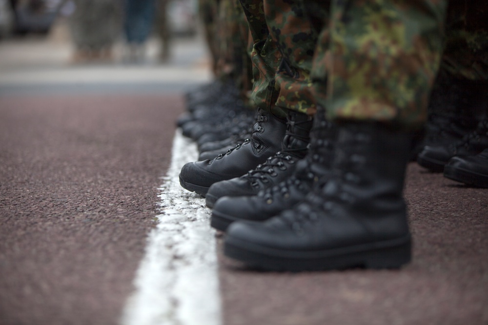 German Soldiers participate in a joint ceremony with U.S. Soldiers in Picauville, France