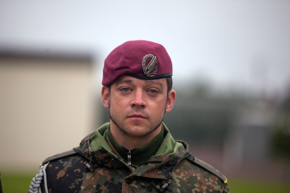 German Soldiers participate in a joint ceremony with U.S. Soldiers in Picauville, France