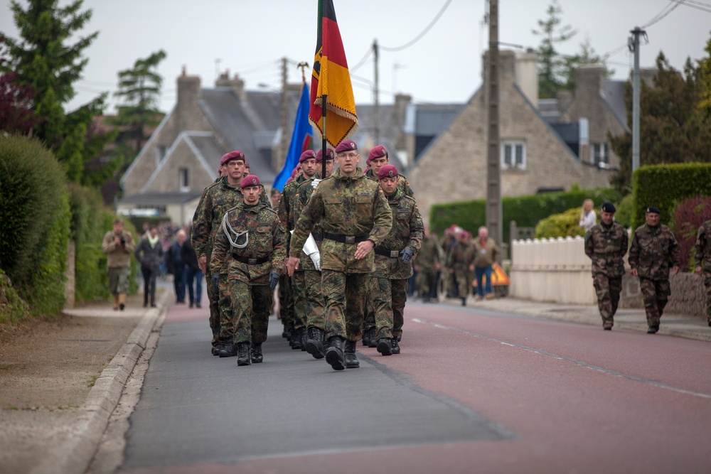 German Soldiers participate in a joint ceremony with U.S. Soldiers in Picauville, France