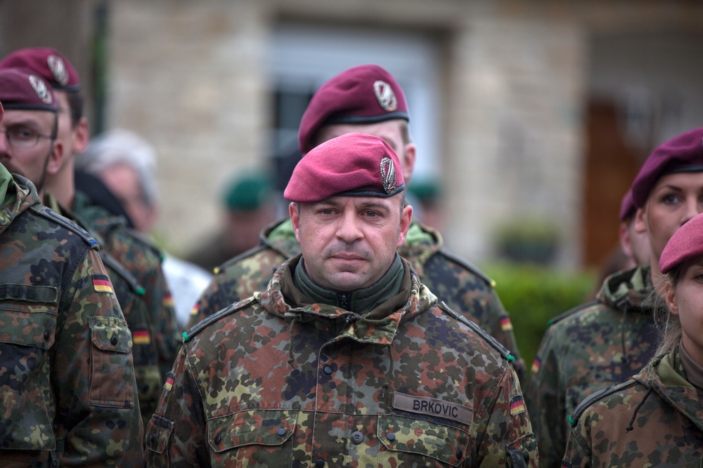 German Soldiers participate in a joint ceremony with U.S. Soldiers in Picauville, France