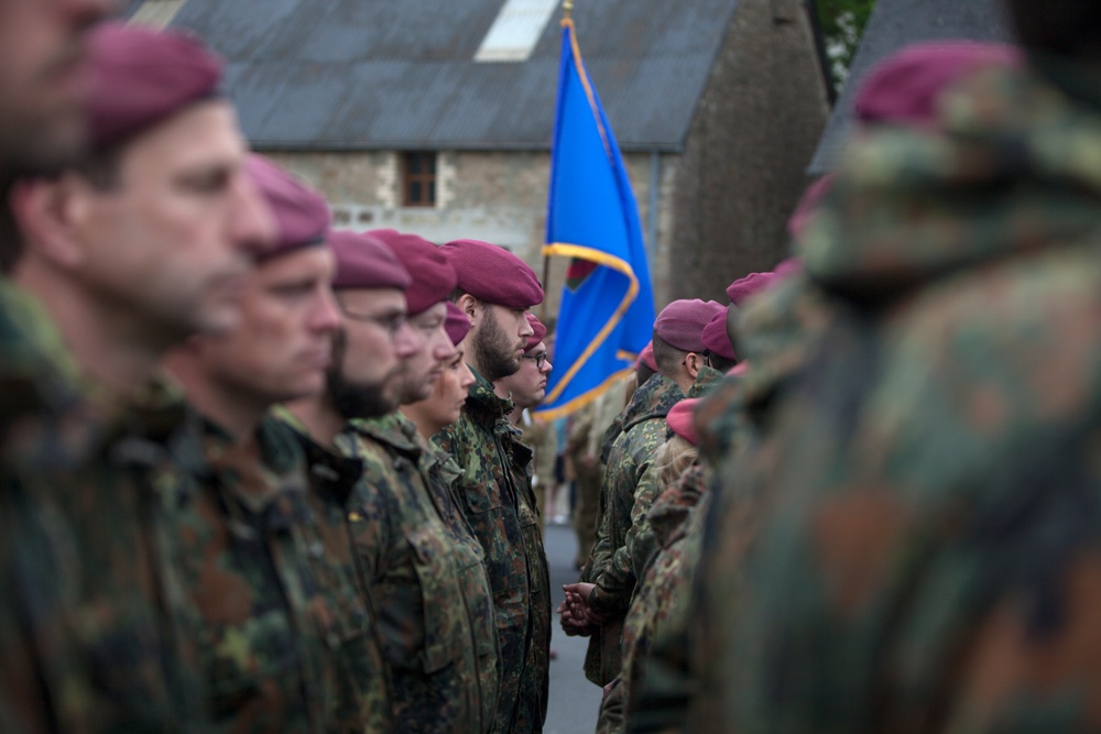 German Soldiers participate in a joint ceremony with U.S. Soldiers in Picauville, France