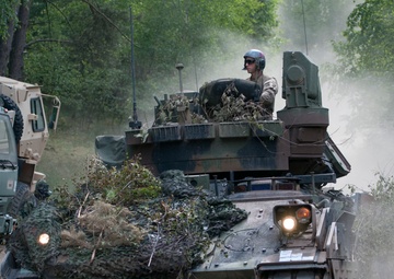 U.S. and Polish Army decontaminate together