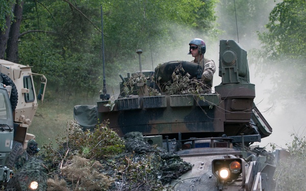 U.S. and Polish Army decontaminate together