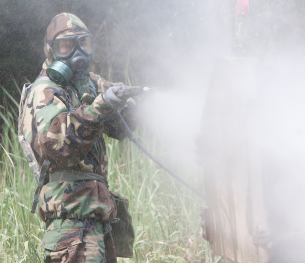 U.S. and Polish Army decontaminate together