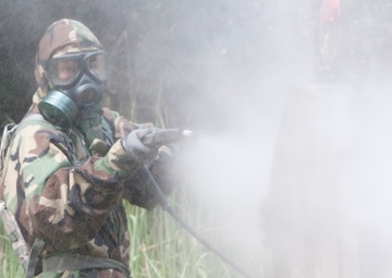 U.S. and Polish Army decontaminate together