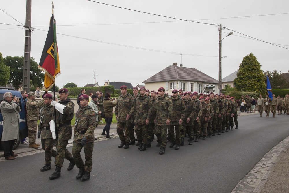 German Soldiers participate in a joint ceremony with U.S. Soldiers in Picauville, France