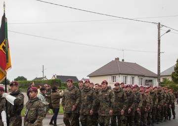 German Soldiers participate in a joint ceremony with U.S. Soldiers in Picauville, France