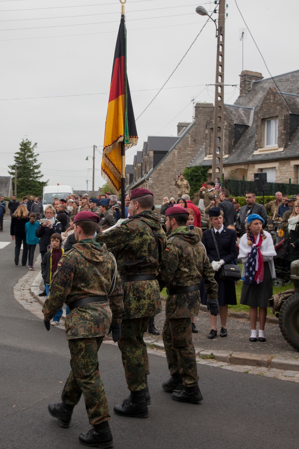 German Soldiers participate in a joint ceremony with U.S. Soldiers in Picauville, France