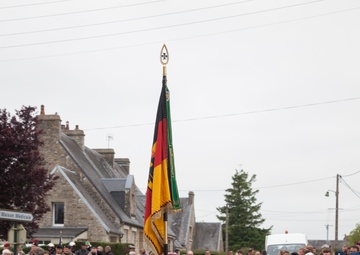 German Soldiers participate in a joint ceremony with U.S. Soldiers in Picauville, France