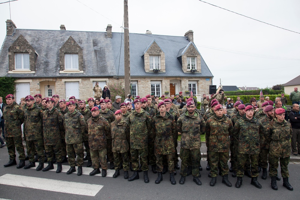 German Soldiers participate in a joint ceremony with U.S. Soldiers in Picauville, France