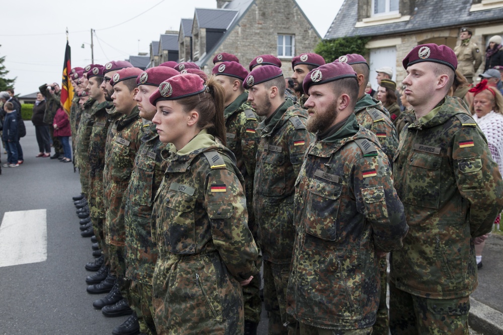 German Soldiers participate in a joint ceremony with U.S. Soldiers in Picauville, France