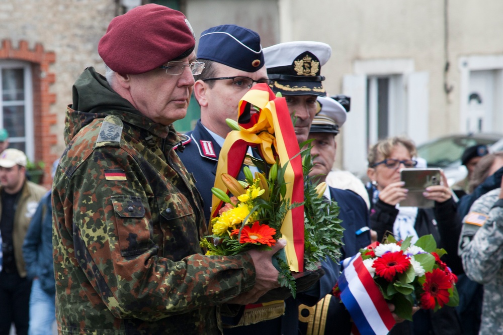 German Soldiers participate in a joint ceremony with U.S. Soldiers in Picauville, France