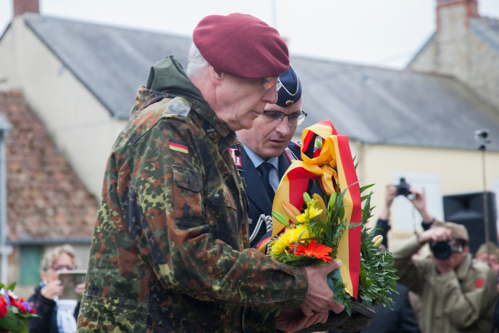 German Soldiers participate in a joint ceremony with U.S. Soldiers in Picauville, France