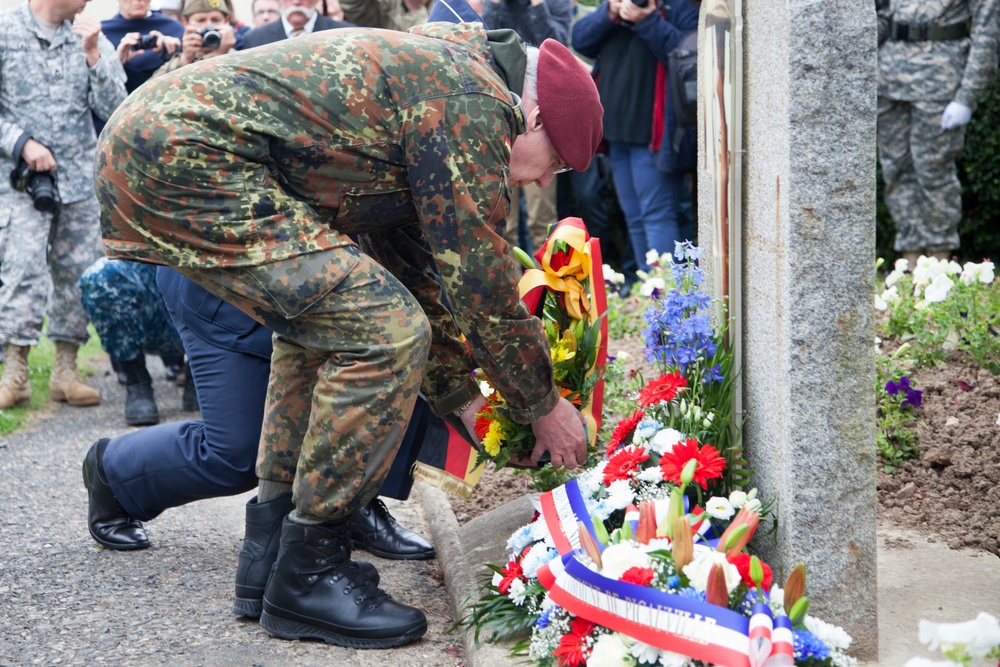 German Soldiers participate in a joint ceremony with U.S. Soldiers in Picauville, France