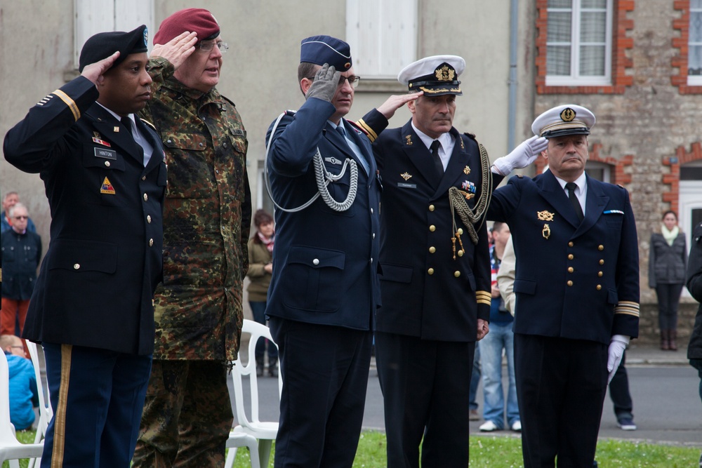 German Soldiers participate in a joint ceremony with U.S. Soldiers in Picauville, France