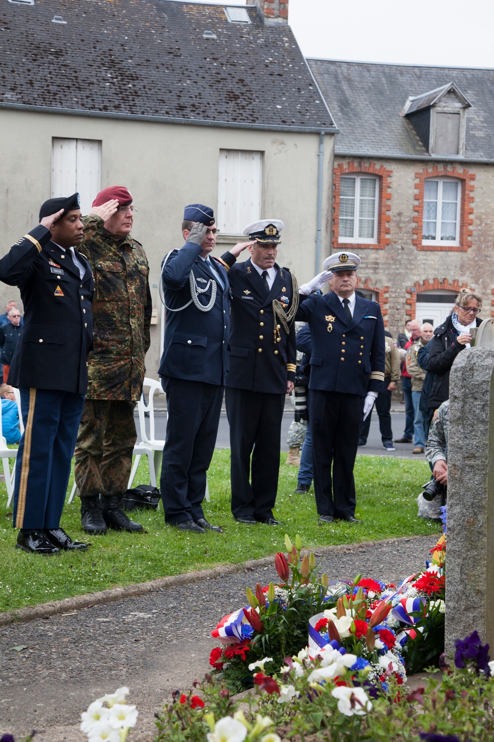 German Soldiers participate in a joint ceremony with U.S. Soldiers in Picauville, France