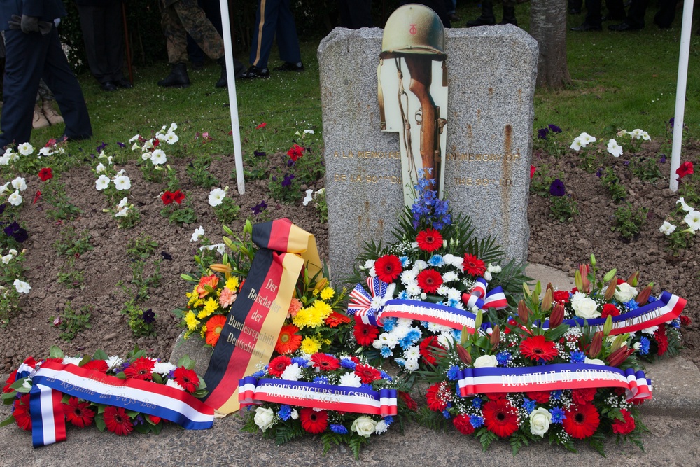 German Soldiers participate in a joint ceremony with U.S. Soldiers in Picauville, France