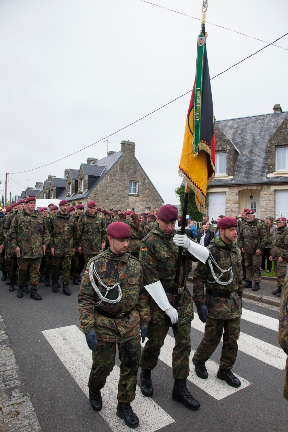 German Soldiers participate in a joint ceremony with U.S. Soldiers in Picauville, France