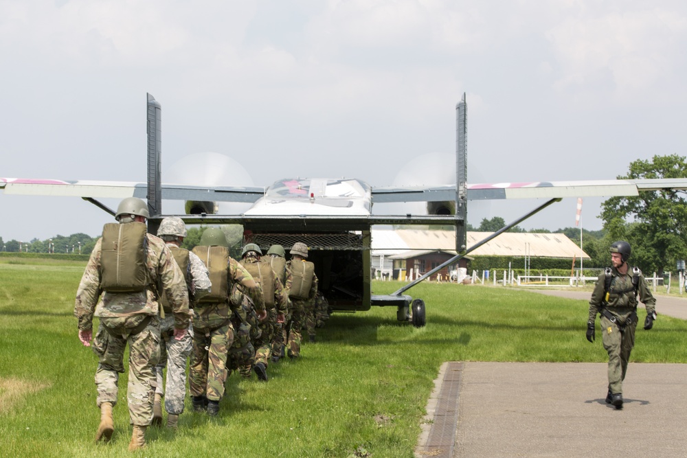 U.S. Army and Dutch and Belgium paratroopers conduct jump training from a Skyvan