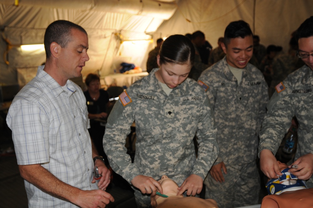 2nd Medical Brigade Soldiers learn how to perform surgical intubation
