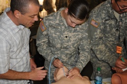 2nd Medical Brigade Soldiers learn how to perform surgical intubation