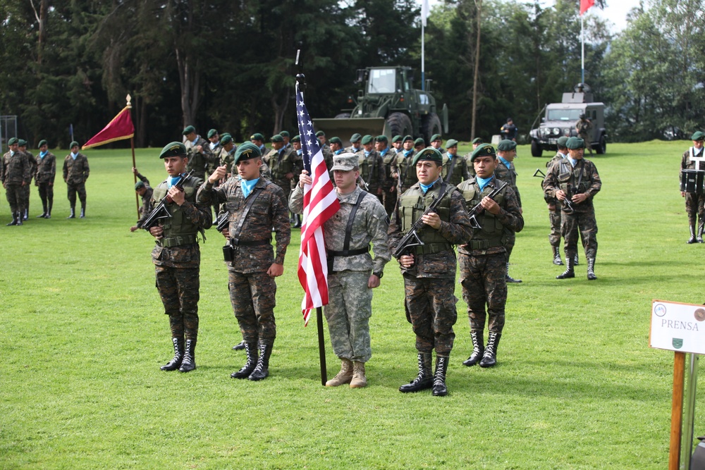 Spc. Mathew Thompson practice with Guatemalan color guard.