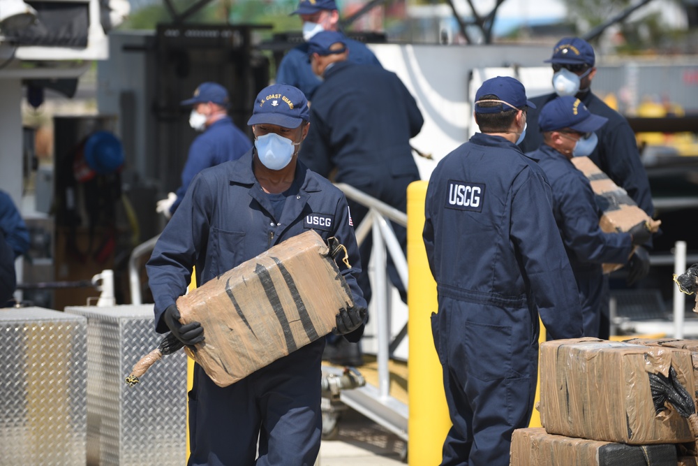 Coast Guardsmen offload approximately eight tons of seized cocaine from the Coast Guard Cutter Bernard C. Webber to Coast Guard Base Miami Beach on June 13, 2016.