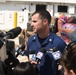 Coast Guard Cmdr. Timothy Cronin, deputy chief of enforcement for the Coast Guard 7th District, speaks to South Florida media outlets during the offload of approximately eight tons of seized cocaine on June 13, 2016.