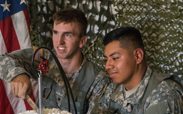Army Reserve Soldiers bake an Army birthday cake