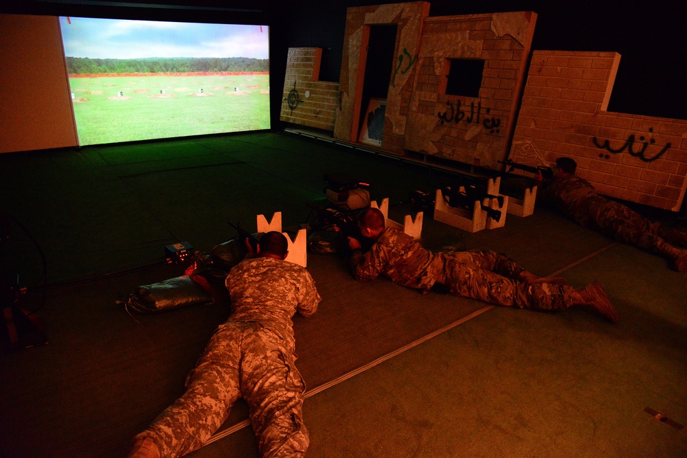 Vicenza Military Intelligence Detachment engage targets at the Engagement Skills Trainer (EST), Caserma Ederle, Vicenza